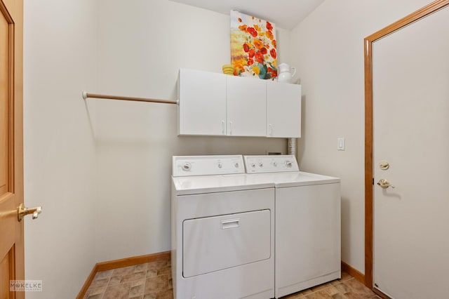 507 Parkland Ct, Oswego, IL 60543 - laundry area with cabinet space, separate washer and dryer, and baseboards