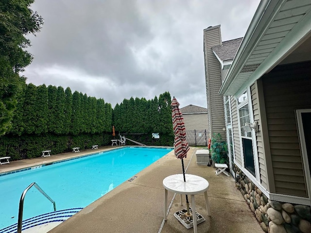 507 Parkland Ct, Oswego, IL 60543 - community pool featuring a patio area