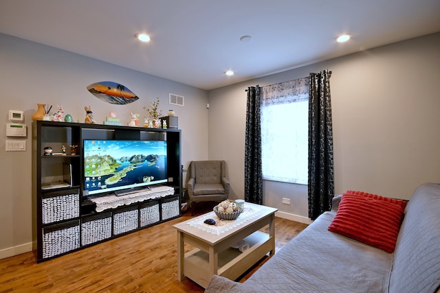 4200 Judd St, Schiller Park, IL 60176 - living area featuring wood finished floors, baseboards, and recessed lighting