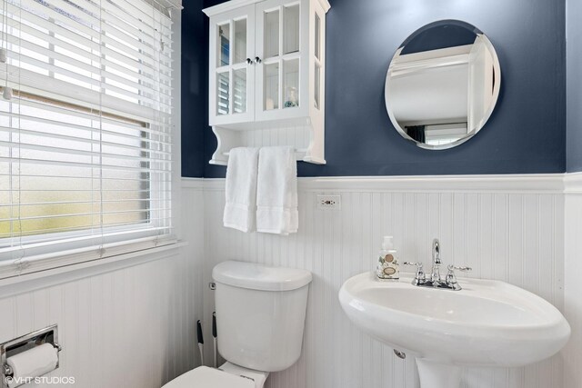 1702 Madsen Ct, Wheaton, IL 60187 - bathroom featuring wainscoting, toilet, and a sink
