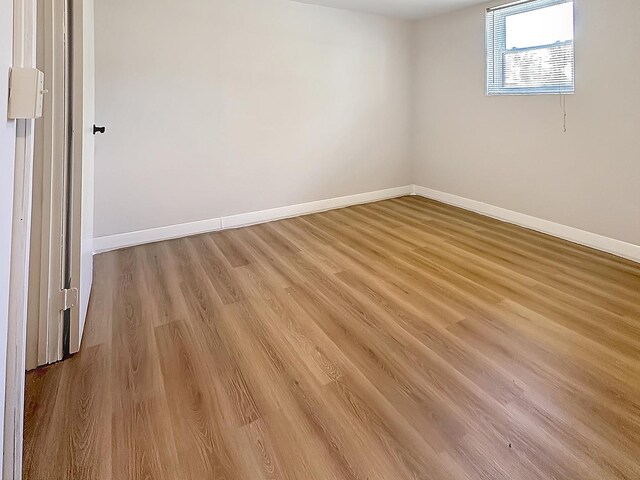 337 E Rose St, Glenwood, IL 60425 - unfurnished room with baseboards and light wood finished floors
