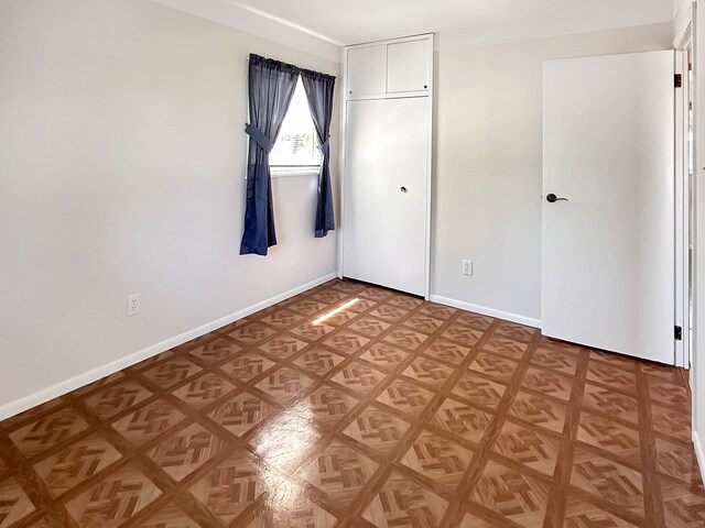 337 E Rose St, Glenwood, IL 60425 - unfurnished bedroom featuring baseboards