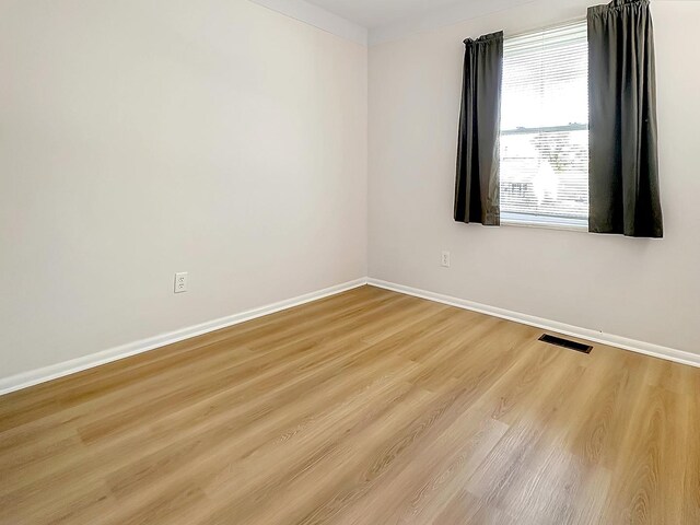 337 E Rose St, Glenwood, IL 60425 - empty room with baseboards and light wood-type flooring