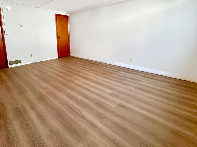 337 E Rose St, Glenwood, IL 60425 - spare room featuring light wood-style flooring and baseboards