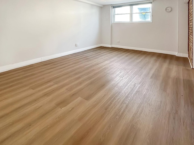 337 E Rose St, Glenwood, IL 60425 - empty room with wood finished floors and baseboards
