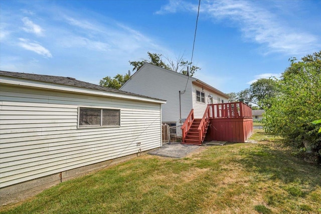 337 E Rose St, Glenwood, IL 60425 - back of property featuring a lawn, a wooden deck, and stairs