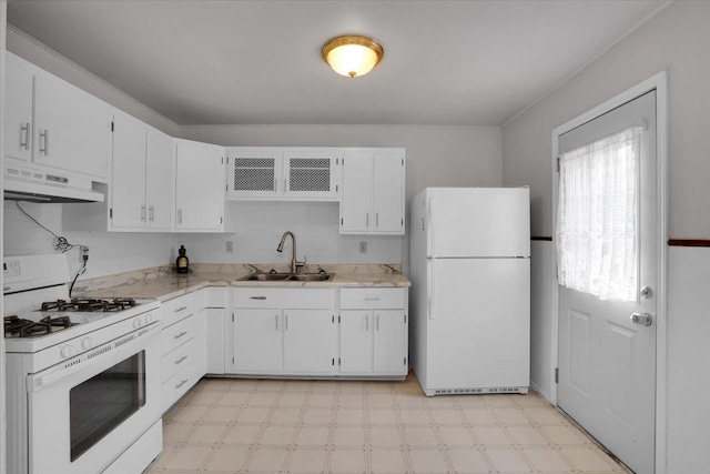 337 E Rose St, Glenwood, IL 60425 - kitchen featuring white appliances, a sink, under cabinet range hood, white cabinetry, and light floors