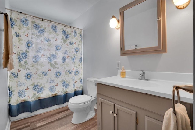 337 E Rose St, Glenwood, IL 60425 - full bath with wood finished floors, toilet, vanity, and shower / bath combo with shower curtain