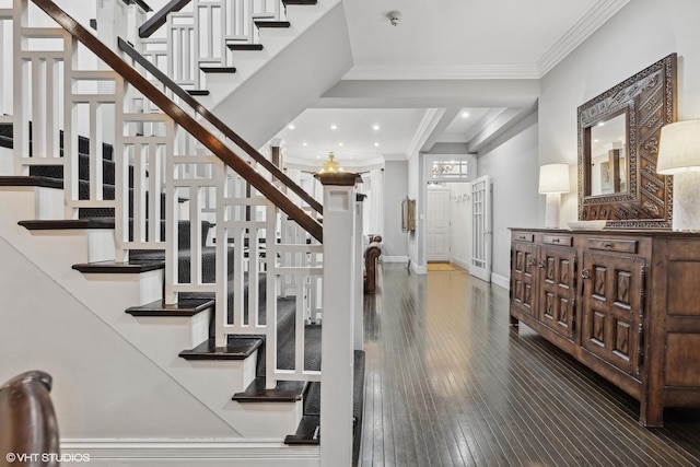 69 E Cedar St, Chicago, IL 60611 - staircase with crown molding, hardwood / wood-style floors, baseboards, and recessed lighting