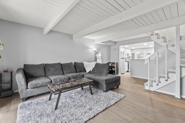 410 Meadow Green Ln, Round Lake, IL 60073 - living area featuring beamed ceiling, stairway, wood finished floors, baseboards, and recessed lighting