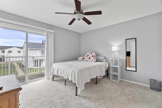 410 Meadow Green Ln, Round Lake, IL 60073 - carpeted bedroom featuring access to exterior, a ceiling fan, and baseboards