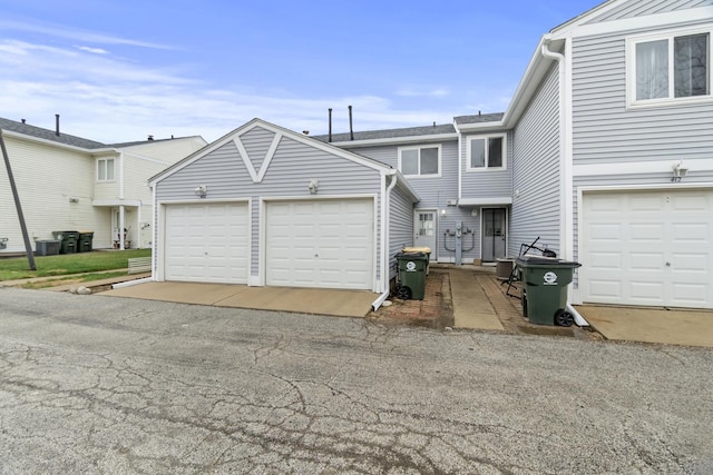 410 Meadow Green Ln, Round Lake, IL 60073 - view of property featuring central AC and an attached garage