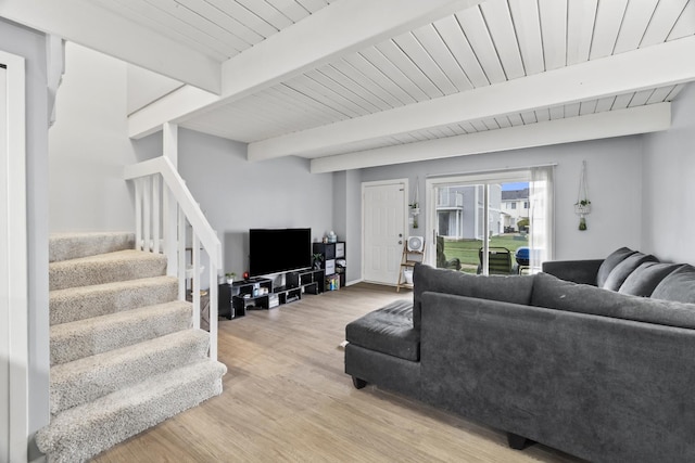 410 Meadow Green Ln, Round Lake, IL 60073 - living room featuring stairs, light wood finished floors, and wooden ceiling with exposed beams