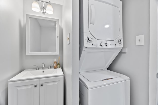 410 Meadow Green Ln, Round Lake, IL 60073 - laundry room featuring stacked washer / dryer