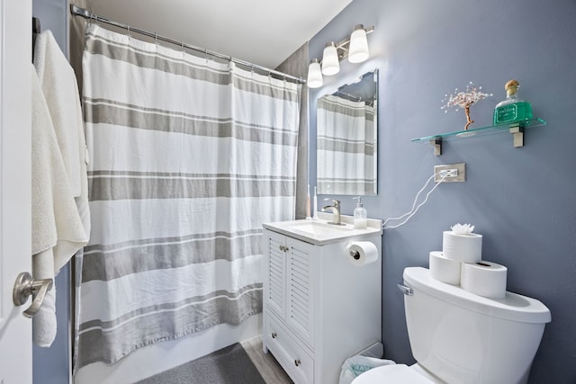 1205 E Hintz Rd Unit 212, Arlington Heights, IL 60004 - full bath featuring toilet, vanity, and a shower with shower curtain