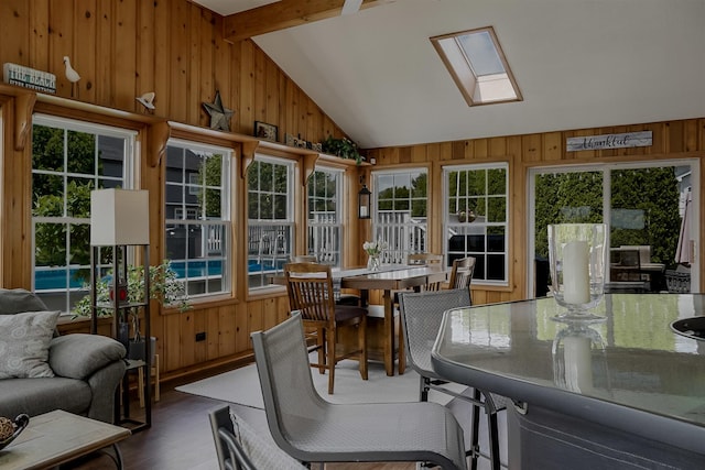 18132 Crystal Ln, Lansing, IL 60438 - sunroom / solarium with wooden walls, plenty of natural light, vaulted ceiling, wood finished floors, and a skylight
