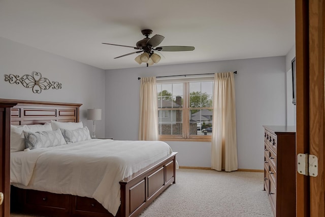 18132 Crystal Ln, Lansing, IL 60438 - bedroom featuring light carpet, baseboards, and a ceiling fan