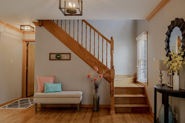 18132 Crystal Ln, Lansing, IL 60438 - staircase featuring wood finished floors, baseboards, and crown molding