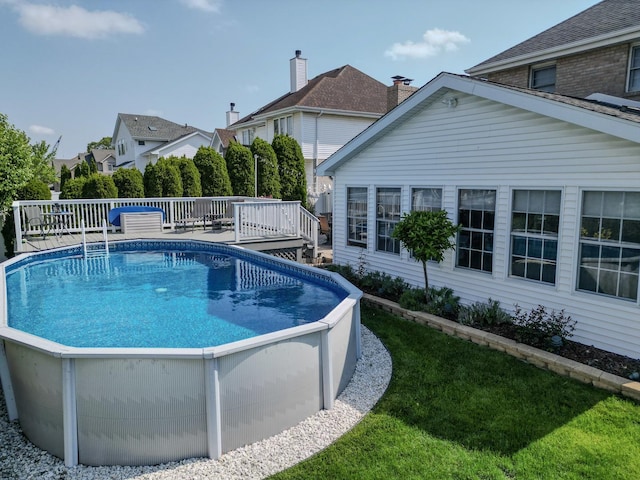 18132 Crystal Ln, Lansing, IL 60438 - swimming pool with a wooden deck and a yard
