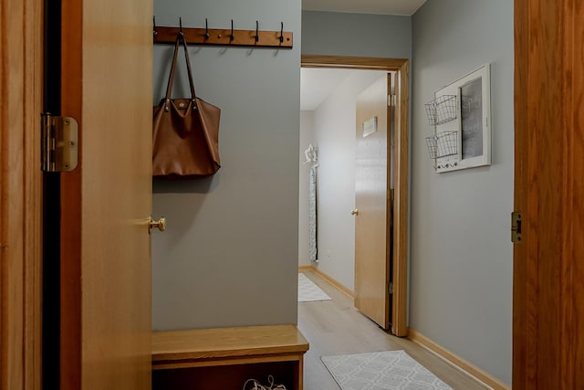 18132 Crystal Ln, Lansing, IL 60438 - mudroom featuring wood finished floors and baseboards