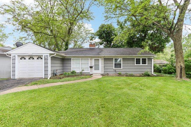 312 Indianwood Blvd, Park Forest, IL 60466 - ranch-style house with a garage, a front yard, a chimney, and asphalt driveway