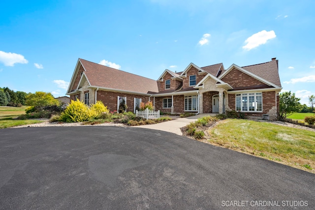1502 Cherry Rd, Oswego, IL 60543 - view of front of property with brick siding and a front lawn