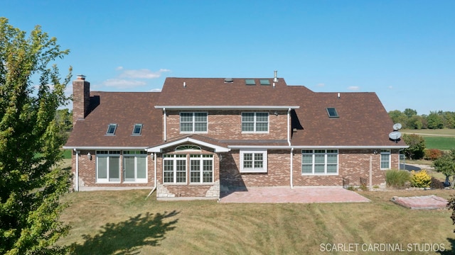 1502 Cherry Rd, Oswego, IL 60543 - back of property with a patio area, a chimney, and a lawn