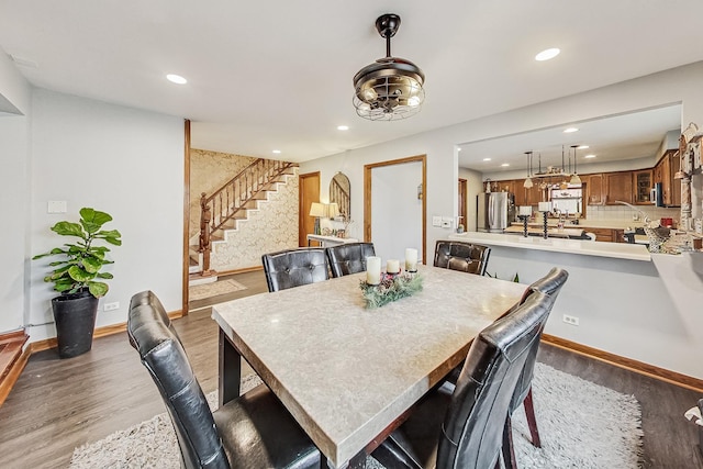 8404 N Greenwood Ave, Niles, IL 60714 - dining space with recessed lighting, light wood finished floors, stairs, and baseboards