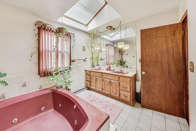 8404 N Greenwood Ave, Niles, IL 60714 - full bathroom featuring tile patterned flooring, a tub with jets, double vanity, and a skylight
