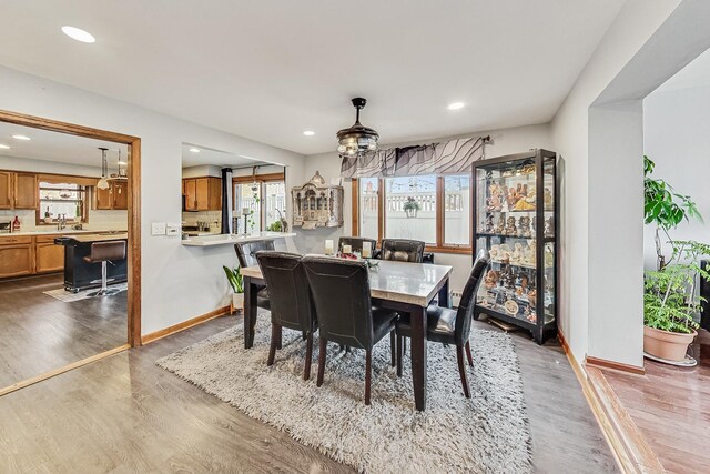 8404 N Greenwood Ave, Niles, IL 60714 - dining room featuring wood finished floors, recessed lighting, and baseboards