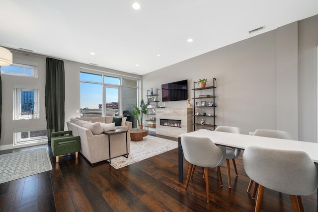 1120 W Adams St Unit 5W, Chicago, IL 60607 - living area featuring a glass covered fireplace, dark wood-style flooring, and recessed lighting