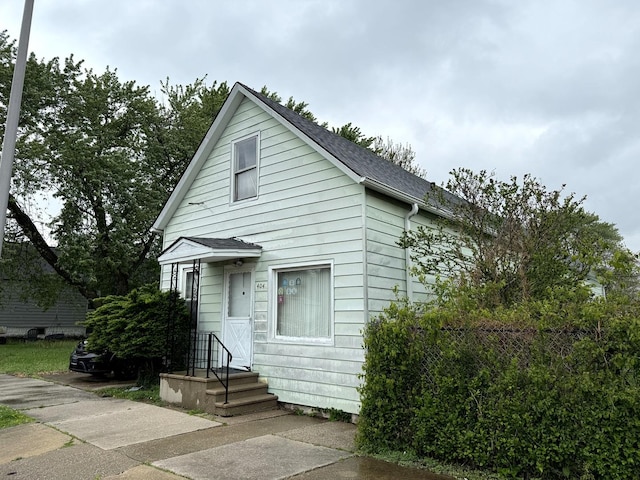 404 155th St, Calumet City, IL 60409 - view of front of house featuring a shingled roof