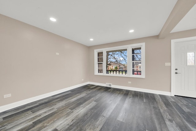 entryway with dark wood-type flooring, baseboards, healthy amount of natural light, and recessed lighting