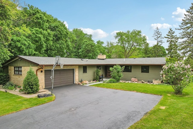 32225 N Pine Ave, Grayslake, IL 60030 - ranch-style house with asphalt driveway, a garage, a front yard, and a chimney