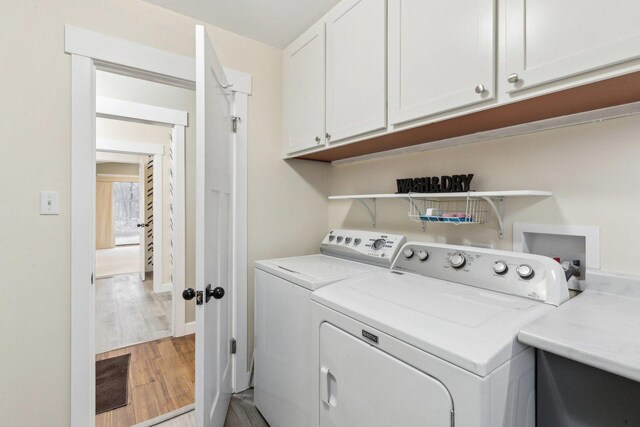 32225 N Pine Ave, Grayslake, IL 60030 - laundry area featuring cabinet space, washer and clothes dryer, and wood finished floors