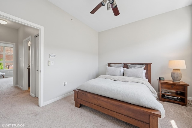 51 E 23rd St Unit 0, Chicago, IL 60616 - bedroom with light colored carpet, baseboards, and a ceiling fan