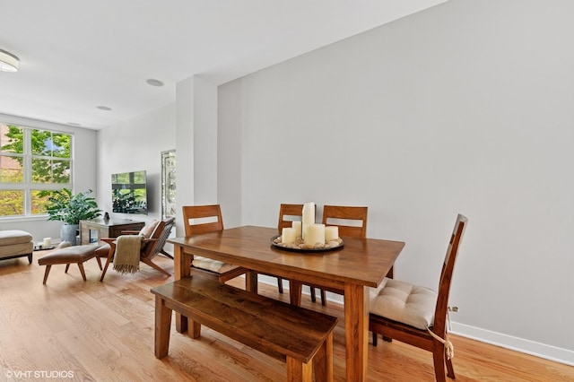 51 E 23rd St Unit 0, Chicago, IL 60616 - dining area with light wood-type flooring and baseboards