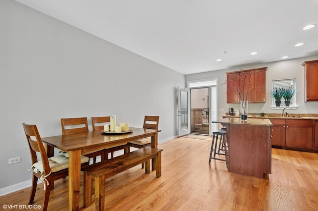 51 E 23rd St Unit 0, Chicago, IL 60616 - dining area featuring light wood-style floors, baseboards, and recessed lighting