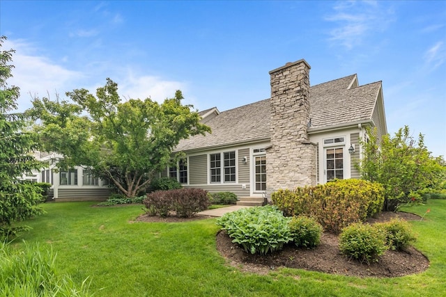 165 S Danbury Ct, Lake Forest, IL 60045 - rear view of house with a lawn and a chimney
