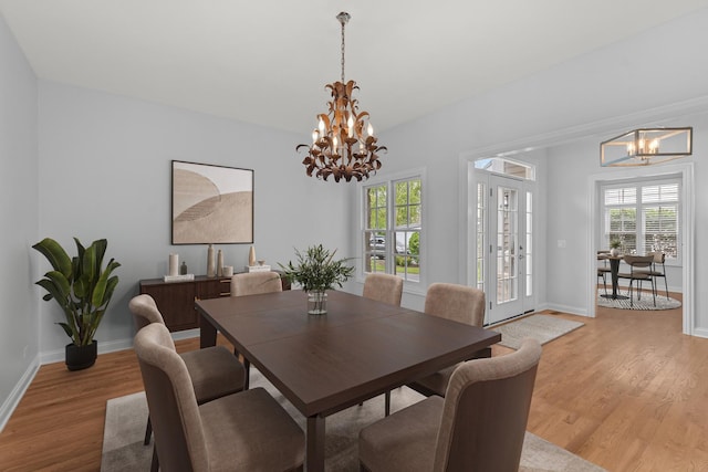 165 S Danbury Ct, Lake Forest, IL 60045 - dining room featuring a chandelier, light wood-type flooring, and baseboards