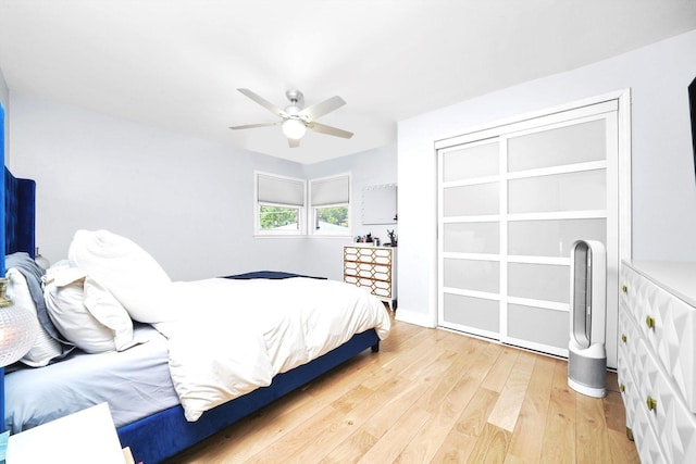8619 Crawford Ave, Skokie, IL 60076 - bedroom featuring light wood finished floors and a ceiling fan