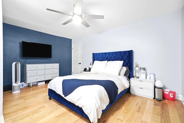 8619 Crawford Ave, Skokie, IL 60076 - bedroom with light wood-style flooring and ceiling fan