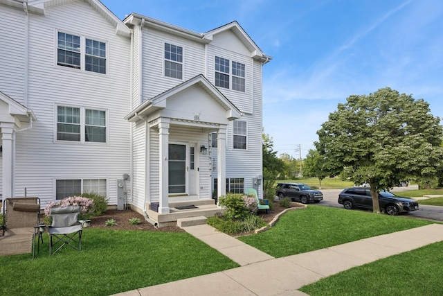 596 N Triumph Ct, Hainesville, IL 60073 - view of front of property featuring a front lawn