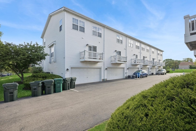 596 N Triumph Ct, Hainesville, IL 60073 - view of building exterior featuring an attached garage