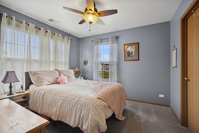 596 N Triumph Ct, Hainesville, IL 60073 - bedroom featuring baseboards, carpet floors, and ceiling fan