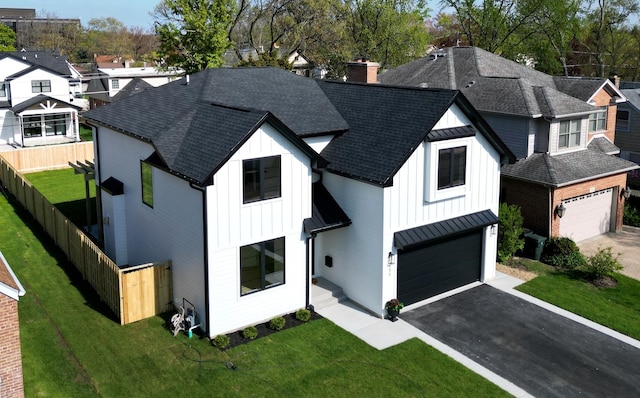 135 Lincoln St, Glenview, IL 60025 - modern farmhouse style home with board and batten siding, a chimney, asphalt driveway, roof with shingles, and an attached garage