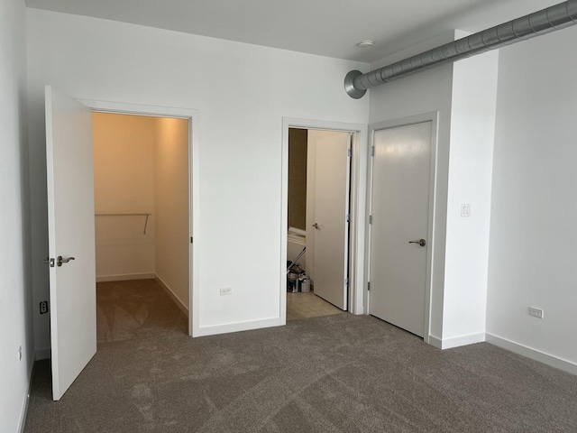 1150 W 15th St Unit 401, Chicago, IL 60608 - unfurnished bedroom featuring carpet and baseboards