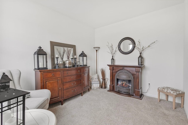 2461 Tahoe Ln, Pingree Grove, IL 60140 - sitting room with light carpet and a warm lit fireplace