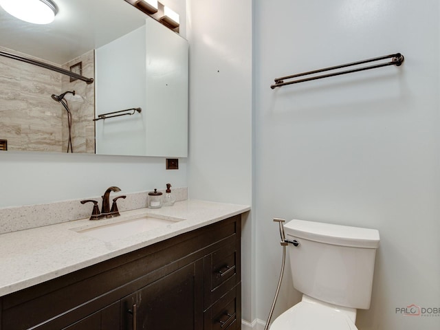 8801 W Golf Rd Unit 6J, Niles, IL 60714 - full bath featuring vanity, toilet, and a shower