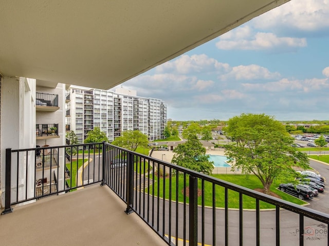 8801 W Golf Rd Unit 6J, Niles, IL 60714 - balcony featuring view of pool